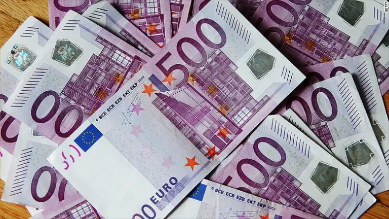Euro heads for first weekly gain in six versus dollar