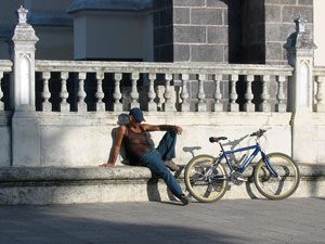 Tico taking a nap with his bike