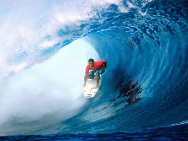 Surfing big wave down