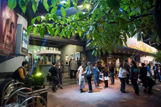 Film fans awaiting a Premiere outside of a movie theater