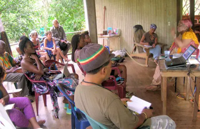 Yeye-Luisah talking about the ancestral African traditions to her class