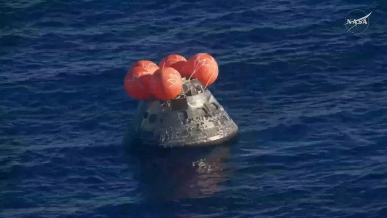 Be sure to use alt text like "Artemis II Orion capsule returning to Earth."
